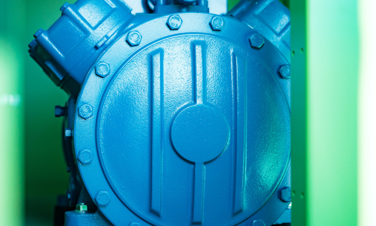 A Frascold ATEX-HT semi-hermetic reciprocating compressor seen inside Tecnofreddo's new Danae high-temperature R290 heat pump