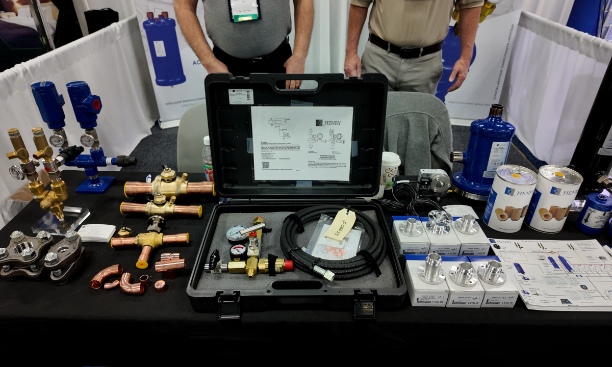 Components for CO2 and ammonia refrigeration systems at the Henry Group's 2026 IIAR Expo booth.