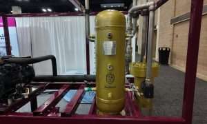 An image of a Vitalis AUthentic oil separator/cartridge system on display at IIAR 2026.